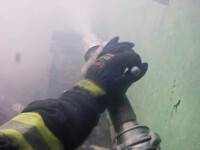pompier care stinge un incendiu in Moldova