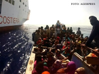 imigranti din Africa interceptati de Paza de Coasta din Italia