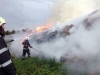 pompieri care sting incendiu