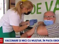 A început vaccinarea în Piața Obor, cu stimulent o porție de mici