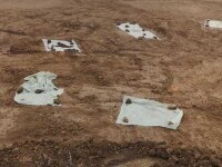 Mai multe gropi cu oseminte au fost descoperite pe şantierul drumului expres Craiova-Piteşti (Video)