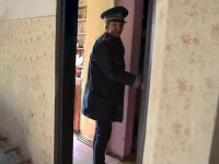 politista ancheteaza mort in casa Targu Jiu