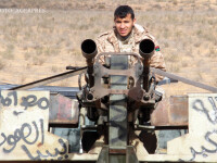 soldat libian cu mitraliere AGERPRES