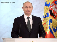 Vladimir Putin cu steagul Rusiei