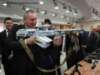 Dmitri Rogozin cu o arma in mana