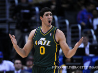 Enes Kanter #0 of Utah Jazz reacts during the game against the Los Angeles Clippers Center on December 28, 2013 in Los Angeles, California
