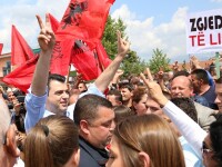 Leader of the Democratic Party of Albania Lulzim Basha (L) attends an unauthorized demonstration in Tirana, Albania