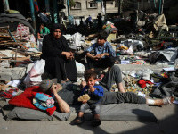 Zeci de palestinieni au fost împuşcaţi mortal după ce se adunaseră pentru ajutor umanitar în Fâşia Gaza. „Un masacru”