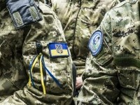 Cecenii mai puțin cunoscuți: Luptă pentru Ucraina ascunzându-și identitatea de frica represaliilor asupra familiilor