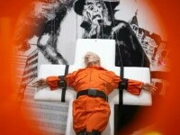 Controversă în Elveția: o sculptură îl arată pe Donald Trump crucificat, în combinezon de deținut