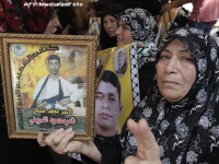 Schimb istoric de prizonieri. 1.027 de detinuti palestinieni pentru un militar israelian