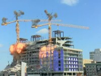 Două macarale gigantice, demolate prin implozie pentru a căuta trupul unui bărbat dispărut