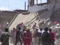 Zeci de kenyeni, filmaţi când jefuiesc o clădire demolată cu câteva secunde înainte