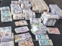 Un bărbat a încercat să iasă din România cu peste 480.000 de lire sterline ascunse în cutii de carton