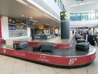 Călătorii care aterizează pe Aeroportul Henri Coandă din Otopeni vor aștepta mai mult bagajele de cală