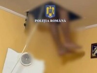 Un bărbat căutat de Poliția Capitalei s-a ascuns într-o gaură din tavan, când au venit mascații să-l ridice. VIDEO