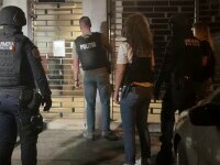 Percheziții în Timișoara la casele unui clan. Polițiștii au găsit arme și o grenadă funcțională