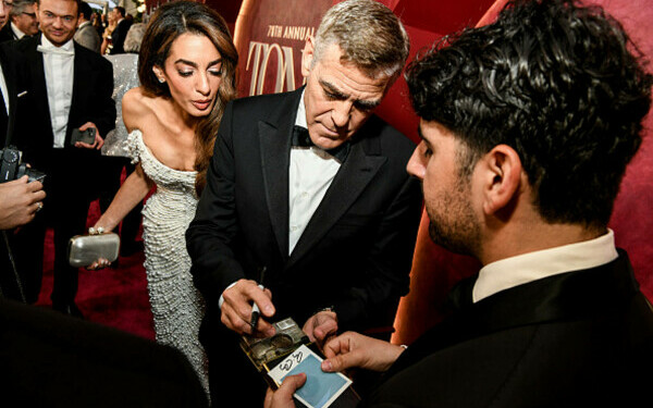 George Clooney și soția sa George Clooney și soția sa
