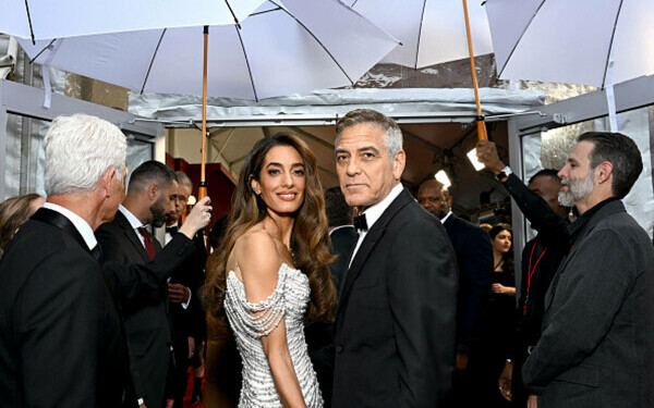 George Clooney și soția sa George Clooney și soția sa