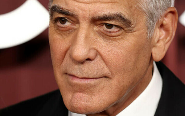 George Clooney și soția sa George Clooney și soția sa