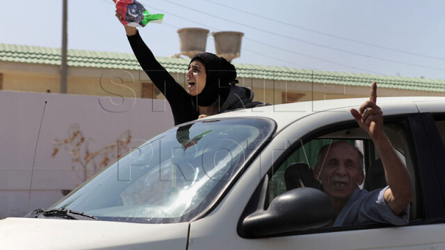 Galeria ororilor din Libia. Cele mai impresionante imagini din razboiul rebelilor cu Ghaddafi - Imaginea 10