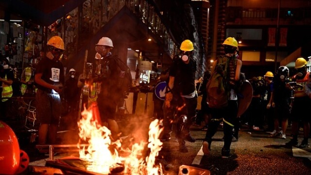 Proteste în Hong Kong. Poliția a folosit gaze lacrimogene împotriva manifestanților - Imaginea 11