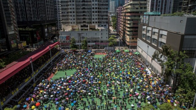 Proteste în Hong Kong. Poliția a folosit gaze lacrimogene împotriva manifestanților - Imaginea 18