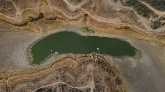 „Ne rugăm la Dumnezeu să ne dea apă”. Un lac din Chile s-a transformat într-un deșert. GALERIE FOTO - Imaginea 3