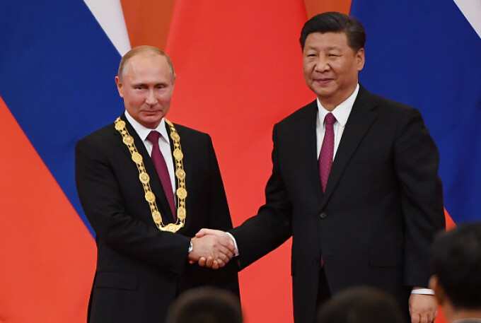 Vladimir Putin a primit la Beijing prima Medalie a prieteniei