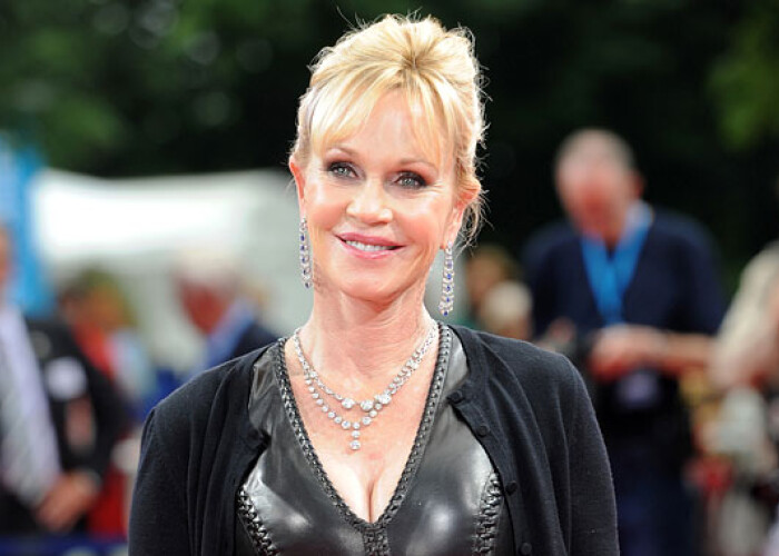 Fotografia este cat se poate de reala: Melanie Griffith a locuit impreuna cu parintii ei si un leu fioros! FOTO