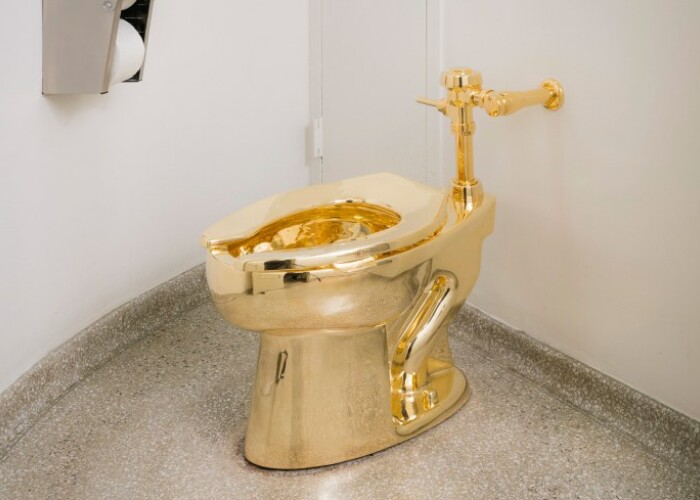 Cel mai scump vas de toaleta din lume costa cat un palat. Pretul la care este evaluata opera artistului italian Maurizio Cattelan