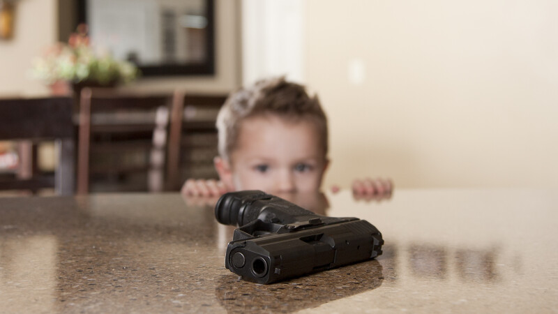 Copil cu arma