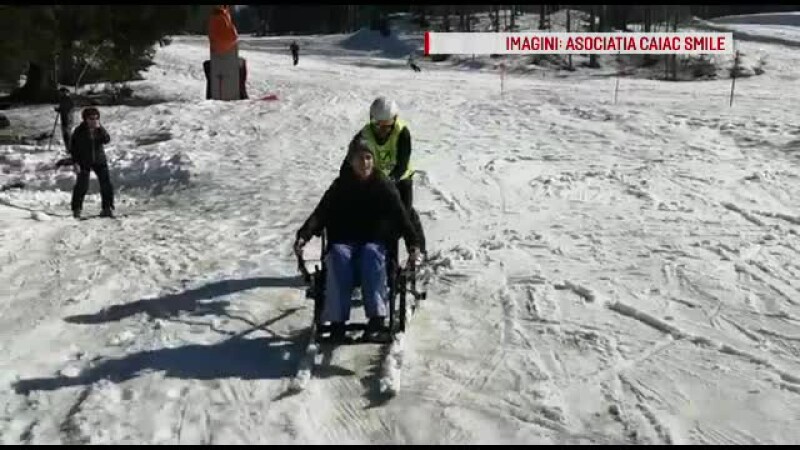 persoane cu handicap la schi