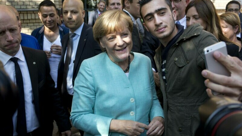 angela merkel refugiati