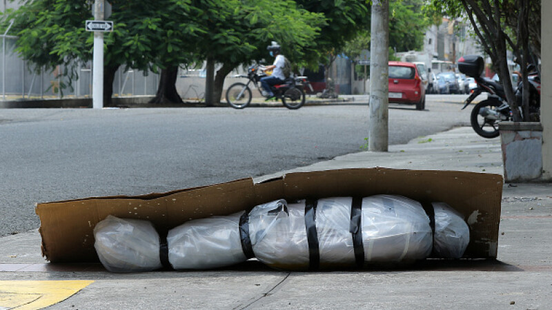 Sute de cadavre depozitate pe străzi sau pierdute în spitale și morgi într-un oraș din Ecuador. GALERIE FOTO - 3