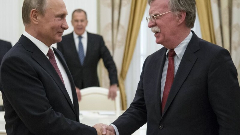 Vladimir Putin şi John Bolton