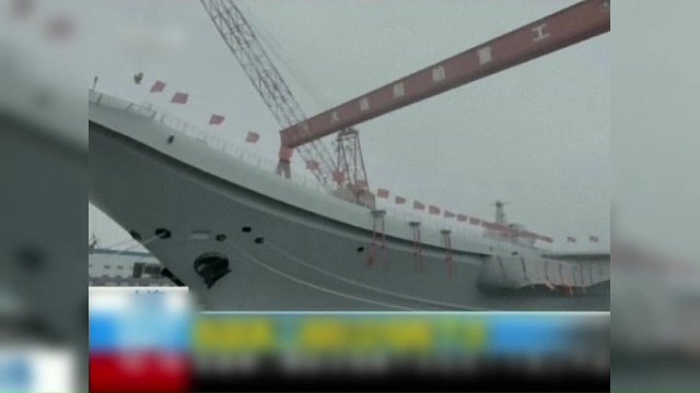 Sarbatoare la Beijing, dupa ce a fost lansat la apa primul portavion 