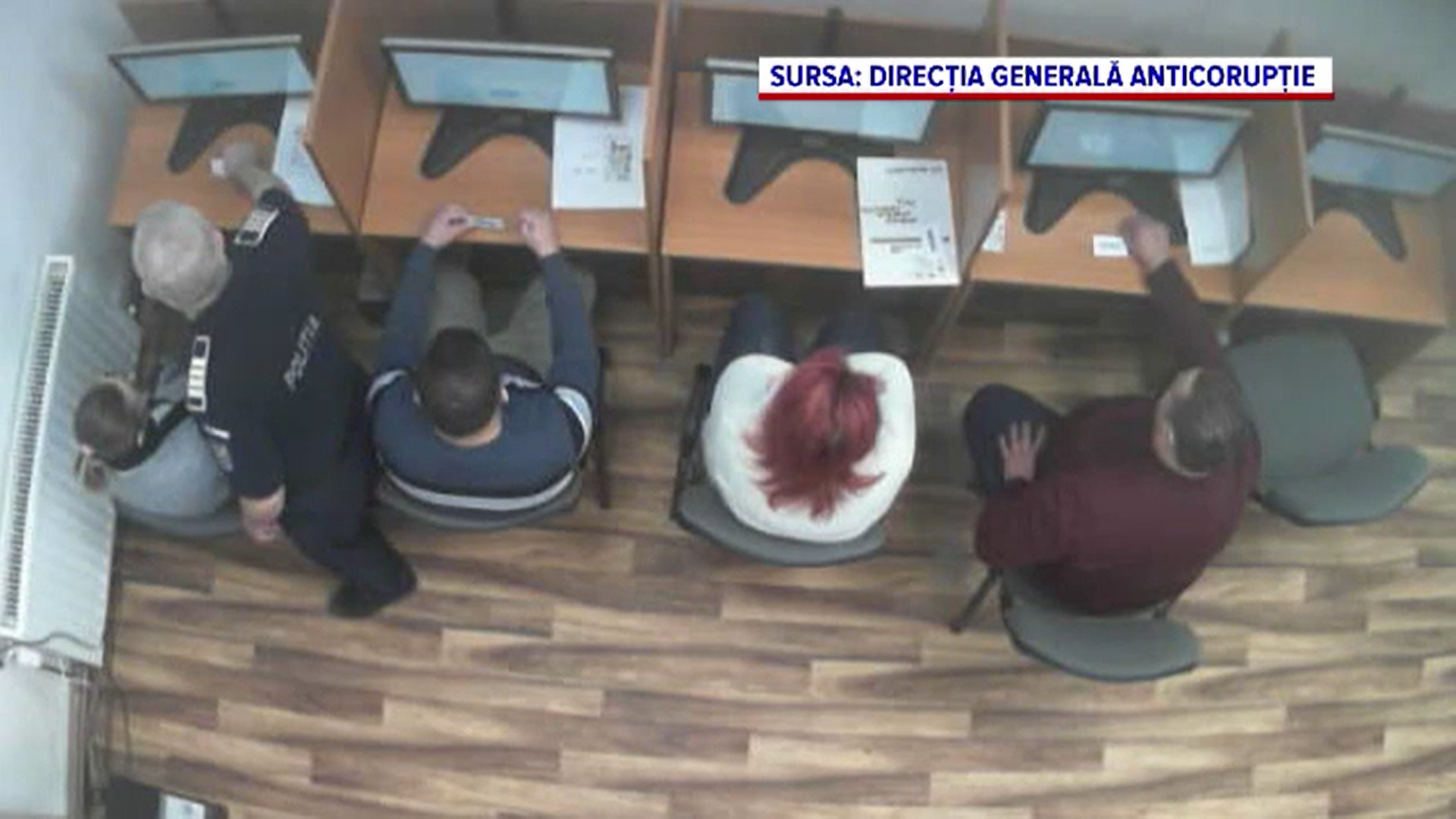 Perchezitii în Galați și Brașov la un grup infracțional care obținea 5000 de euro pentru a ”sufla” la examenul teoretic auto