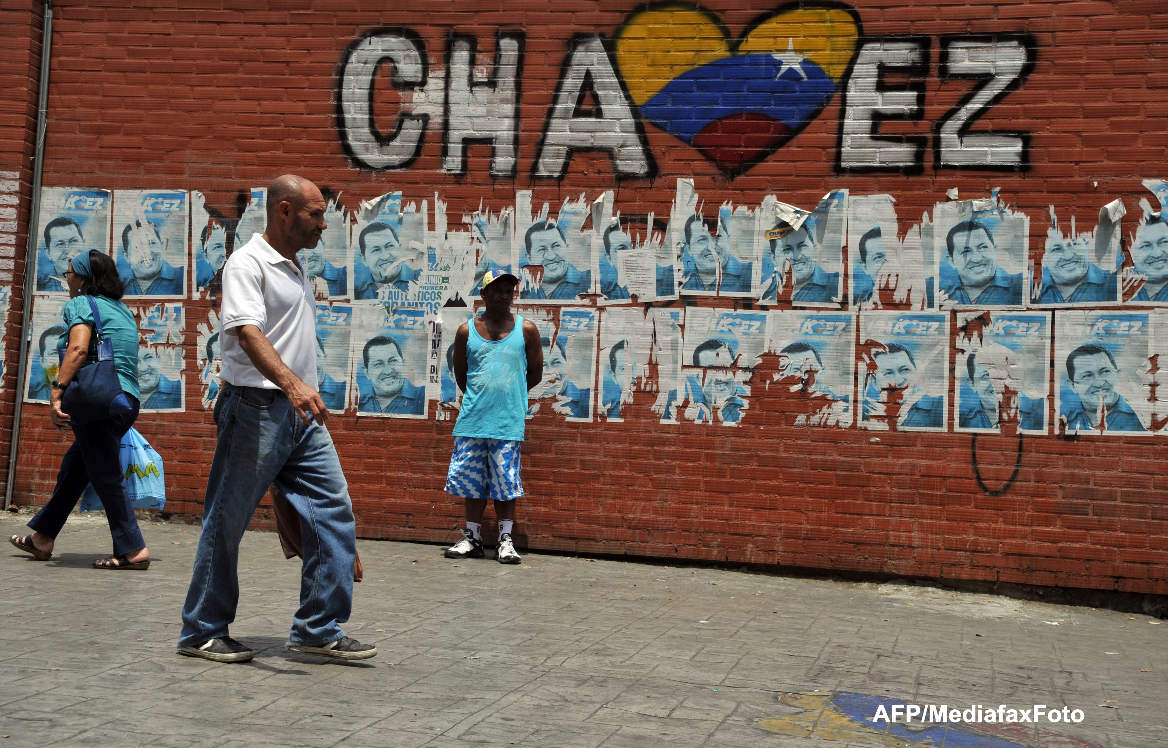 Locuitorii unui cartier din Caracas, mandri ca vor fi vecinii corpului imbalsamat al lui Chavez