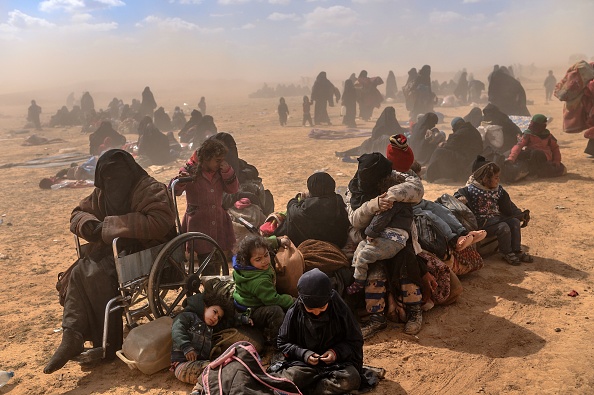 Ultimii jihadişti ISIS, printre care copii şi invalizi, dau bătălia finală. GALERIE FOTO - Imaginea 1