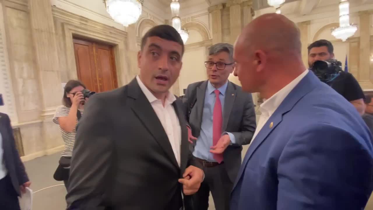 VIDEO. Ministrul Energiei, hărțuit de liderul AUR George Simion pe holurile Parlamentului