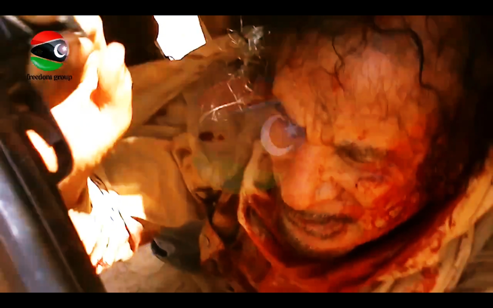 Cel mai clar VIDEO cu Ghaddafi inca in viata, cu 5 minute inainte sa fie ucis. Imagini socante